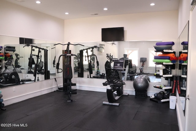 3347 Island Lakes Dr, Oak Island, NC 28461 - gym with visible vents and recessed lighting