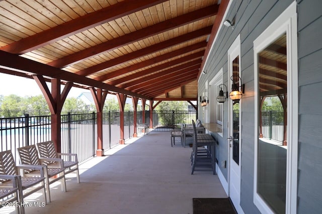 3347 Island Lakes Dr, Oak Island, NC 28461 - view of patio with fence