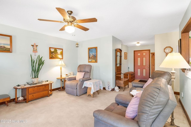 3421 Bethel Rd, Wilmington, NC 28409 - living room featuring light colored carpet, ceiling fan, and baseboards