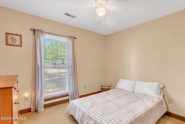 3421 Bethel Rd, Wilmington, NC 28409 - bedroom with visible vents, baseboards, and light carpet