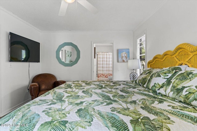 7501 E Oak Island Dr, Oak Island, NC 28465 - bedroom with connected bathroom, crown molding, and a ceiling fan