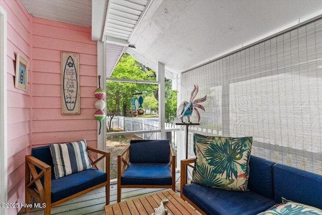 7501 E Oak Island Dr, Oak Island, NC 28465 - view of sunroom / solarium