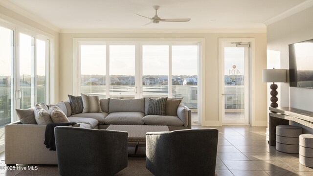 1800 Canal Dr Unit 401, Carolina Beach, NC 28428 - tiled living room with a ceiling fan and crown molding