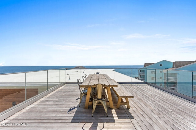 1800 Canal Dr Unit 401, Carolina Beach, NC 28428 - wooden deck featuring a water view and outdoor dining area