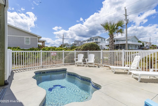 1113 Ocean Dr, Emerald Isle, NC 28594 - view of swimming pool with a swimming pool, a patio area, fence, and a residential view