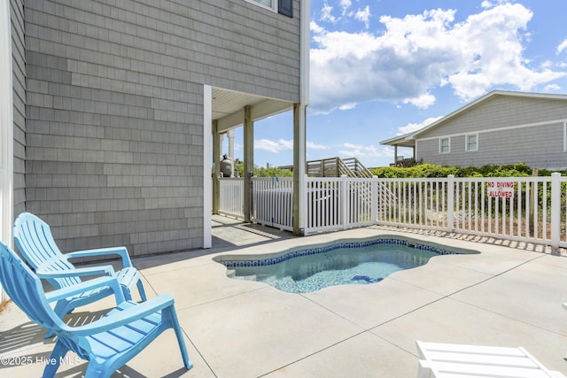 1113 Ocean Dr, Emerald Isle, NC 28594 - view of swimming pool with fence and a patio area
