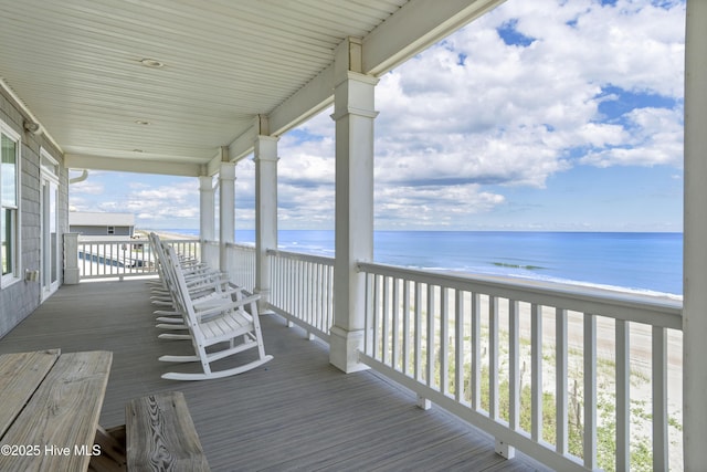 1113 Ocean Dr, Emerald Isle, NC 28594 - deck with a water view and a beach view