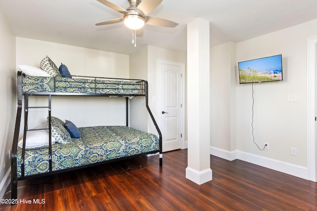 1113 Ocean Dr, Emerald Isle, NC 28594 - bedroom with baseboards and wood finished floors