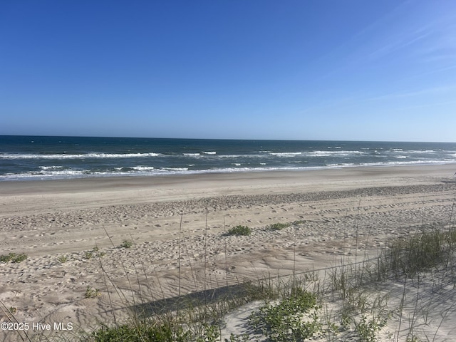 1113 Ocean Dr, Emerald Isle, NC 28594 - property view of water with a view of the beach