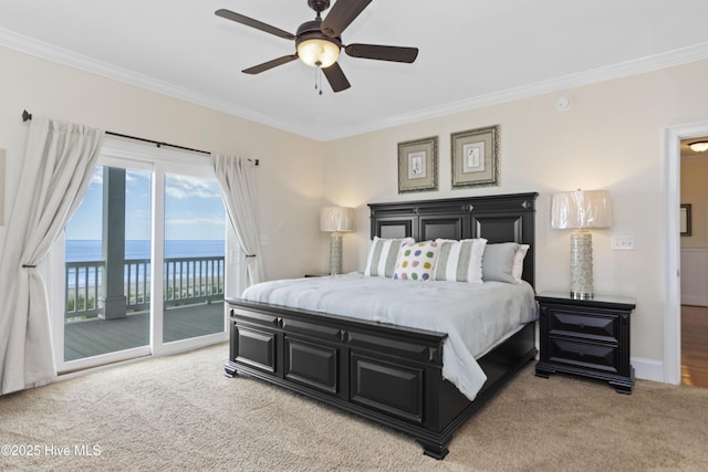 1113 Ocean Dr, Emerald Isle, NC 28594 - bedroom with a ceiling fan, ornamental molding, a water view, access to outside, and light carpet