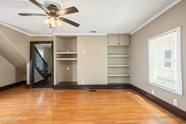 802 2nd St, Elizabeth City, NC 27909 - interior space with light wood-style floors, visible vents, baseboards, and ornamental molding
