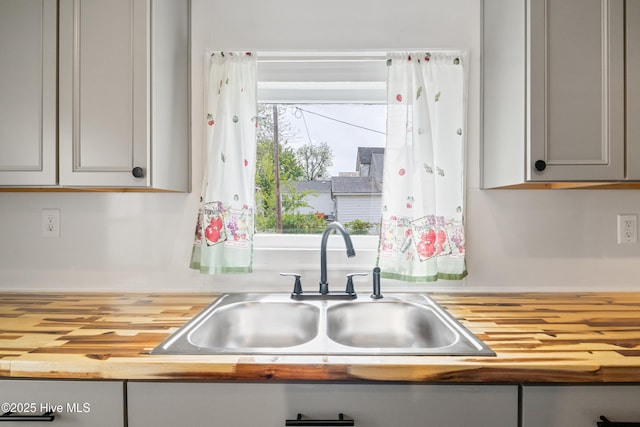 802 2nd St, Elizabeth City, NC 27909 - kitchen with wooden counters and a sink