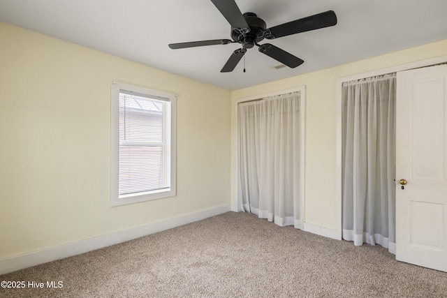 802 2nd St, Elizabeth City, NC 27909 - unfurnished bedroom featuring carpet flooring, baseboards, and a ceiling fan