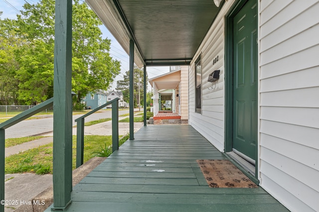 802 2nd St, Elizabeth City, NC 27909 - wooden terrace featuring covered porch
