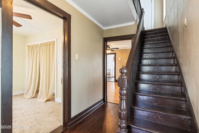 802 2nd St, Elizabeth City, NC 27909 - stairway with ornamental molding, wood finished floors, baseboards, and ceiling fan
