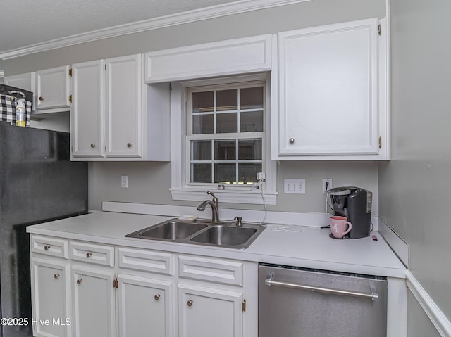 kitchen featuring stainless steel dishwasher, white cabinetry, a sink, and light countertops