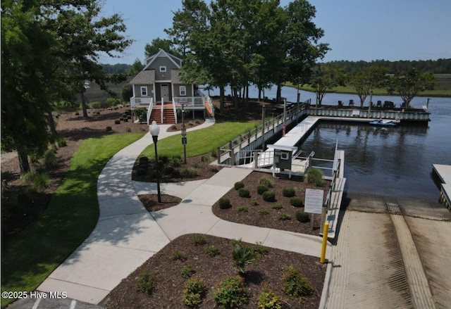1626 Amberwood Dr SE, Bolivia, NC 28422 - view of community with a water view and a dock