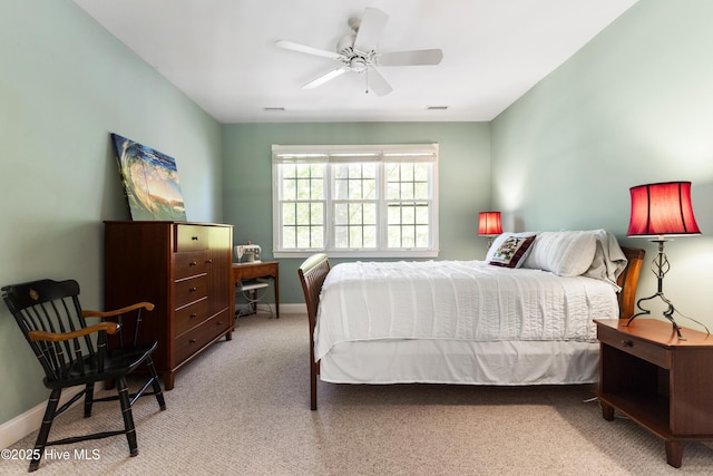 1626 Amberwood Dr SE, Bolivia, NC 28422 - carpeted bedroom featuring baseboards, a ceiling fan, and visible vents