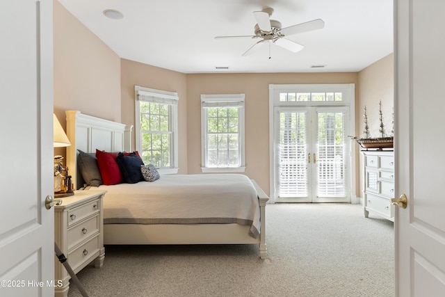 1626 Amberwood Dr SE, Bolivia, NC 28422 - bedroom featuring carpet, a ceiling fan, french doors, and access to outside