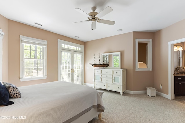1626 Amberwood Dr SE, Bolivia, NC 28422 - bedroom featuring visible vents, baseboards, light colored carpet, access to outside, and ensuite bathroom