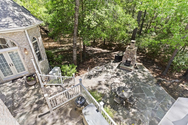 1626 Amberwood Dr SE, Bolivia, NC 28422 - exterior space featuring a patio area, french doors, and outdoor dining space