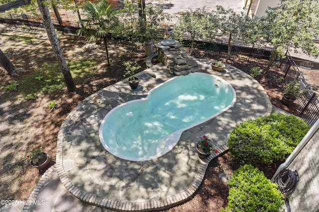 1626 Amberwood Dr SE, Bolivia, NC 28422 - view of swimming pool with fence