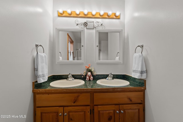121 Pinewood Acres Dr, Powells Point, NC 27966 - full bathroom featuring a sink and double vanity