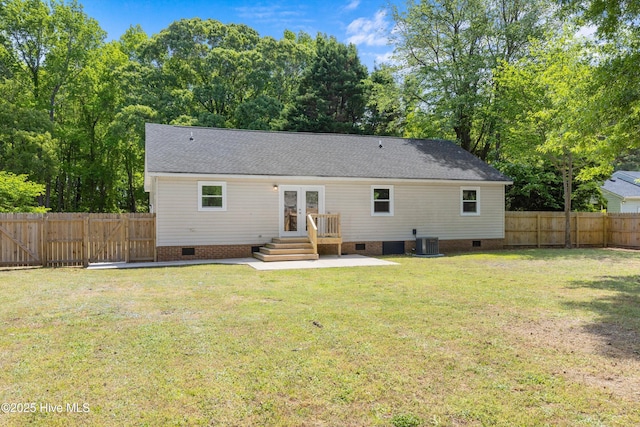 back of house with french doors, cooling unit, a fenced backyard, and crawl space
