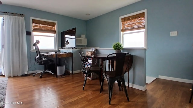 342 Owens Ln # 5, Columbia, NC 27925 - dining room featuring healthy amount of natural light, wood finished floors, baseboards, and a desk