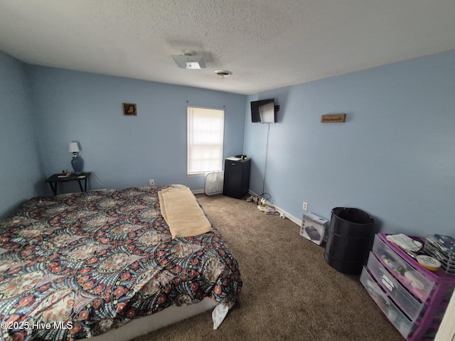 106 N Secrest St, Kinston, NC 28501 - carpeted bedroom with a textured ceiling and baseboards