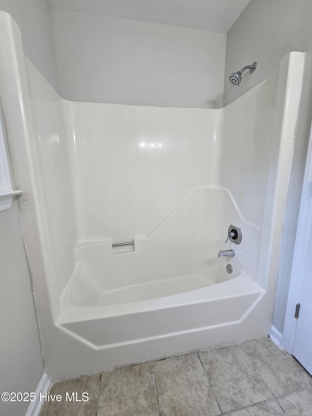 full bathroom featuring shower / bathtub combination and tile patterned floors