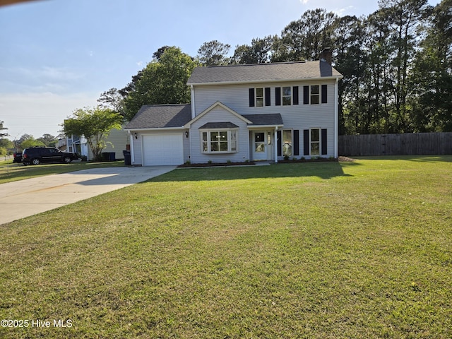 view of front of home with a chimney, a front lawn, driveway, an attached garage, and fence