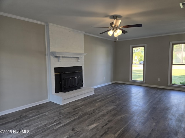 unfurnished living room with visible vents, a brick fireplace, dark wood-style floors, and ceiling fan
