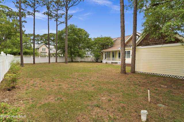 view of yard featuring a fenced backyard