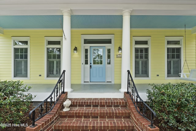 doorway to property with covered porch