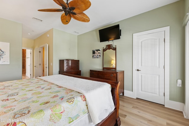 1605 Mackerel Ln Unit 2, Carolina Beach, NC 28428 - bedroom featuring light wood-style floors and a ceiling fan