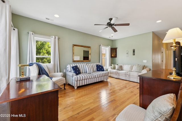 1605 Mackerel Ln Unit 2, Carolina Beach, NC 28428 - living room with wood finished floors, a ceiling fan, and recessed lighting