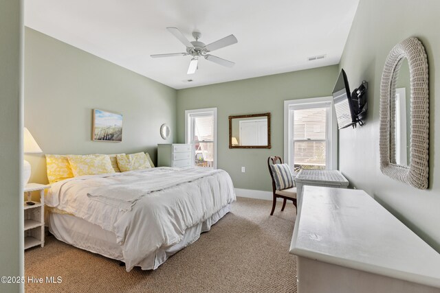 1605 Mackerel Ln Unit 2, Carolina Beach, NC 28428 - bedroom featuring carpet floors, baseboards, and a ceiling fan