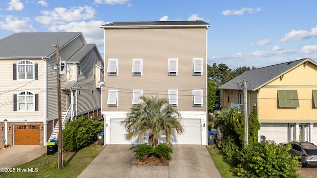 1605 Mackerel Ln Unit 2, Carolina Beach, NC 28428 - coastal inspired home with a garage and driveway