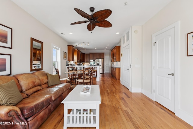1605 Mackerel Ln Unit 2, Carolina Beach, NC 28428 - living area featuring a ceiling fan, light wood-type flooring, recessed lighting, and baseboards