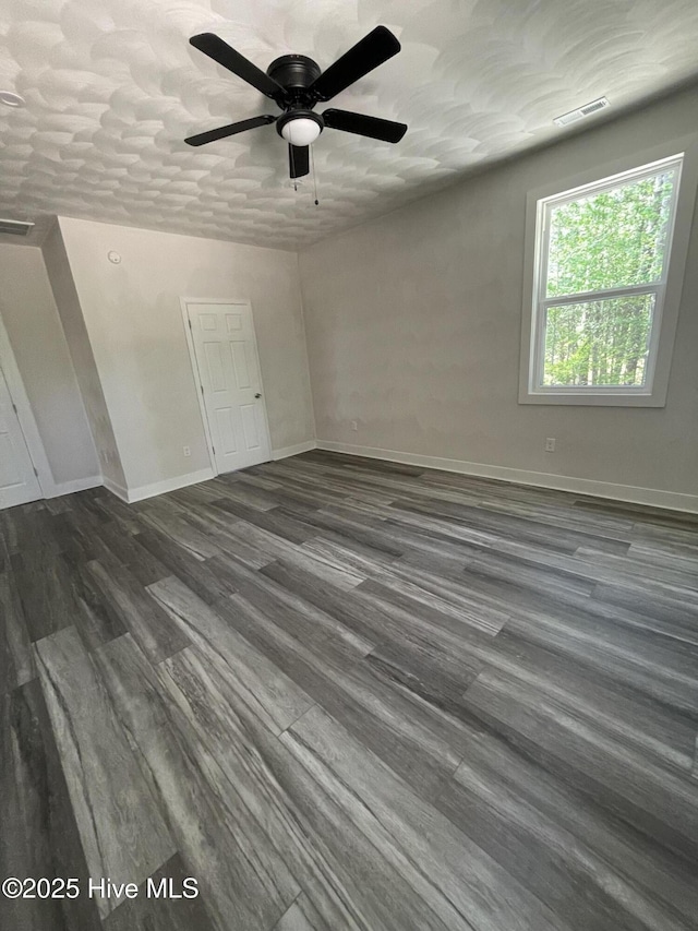 433 Riversound Dr, Edenton, NC 27932 - unfurnished room with baseboards, visible vents, ceiling fan, and dark wood-style flooring