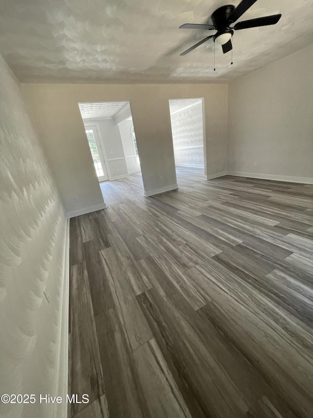 433 Riversound Dr, Edenton, NC 27932 - unfurnished living room with dark wood finished floors, baseboards, and ceiling fan