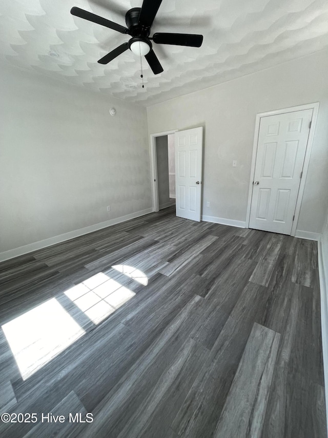 433 Riversound Dr, Edenton, NC 27932 - unfurnished bedroom featuring ceiling fan, baseboards, and dark wood-style floors