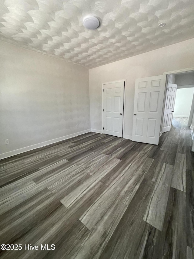 433 Riversound Dr, Edenton, NC 27932 - spare room with dark wood-type flooring and baseboards