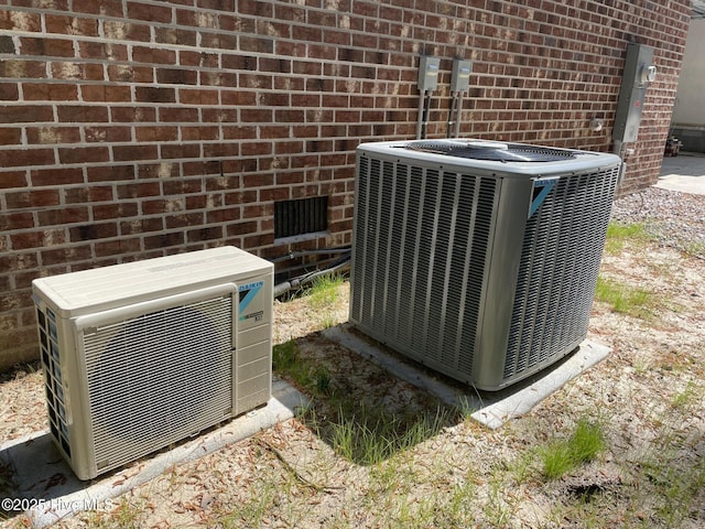 433 Riversound Dr, Edenton, NC 27932 - exterior details with brick siding, electric meter, central AC, and ac unit