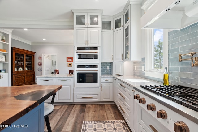 333 N Island Xing, Edenton, NC 27932 - kitchen with double oven, wood finished floors, white cabinetry, and gas cooktop
