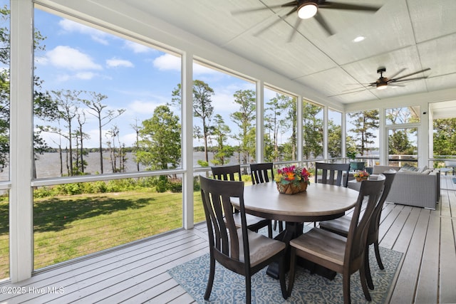 333 N Island Xing, Edenton, NC 27932 - sunroom with a wooden deck, outdoor dining area, ceiling fan, and wood-type flooring
