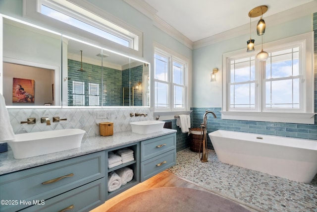 333 N Island Xing, Edenton, NC 27932 - bathroom featuring tile walls, a wealth of natural light, and a sink