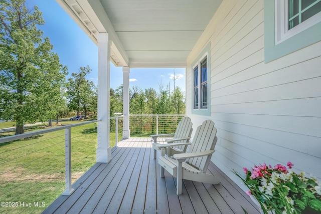 333 N Island Xing, Edenton, NC 27932 - wooden deck with a lawn and covered porch