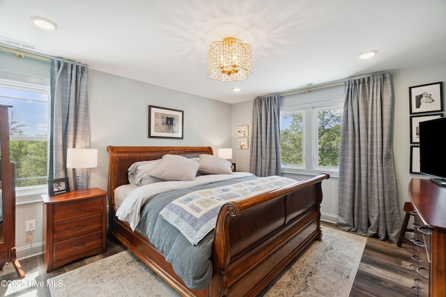 333 N Island Xing, Edenton, NC 27932 - bedroom featuring wood finished floors, recessed lighting, a chandelier, and multiple windows